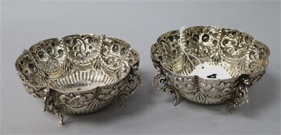 A pair of late Victorian repousse cusped silver bowl, Sheffield, 1897, 7 oz.